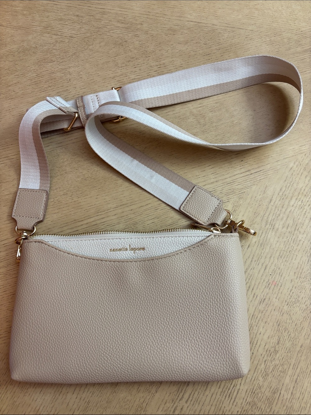 Nannette Lepore Pebbled Leather Crossbody Bag in Light Beige with Striped Strap